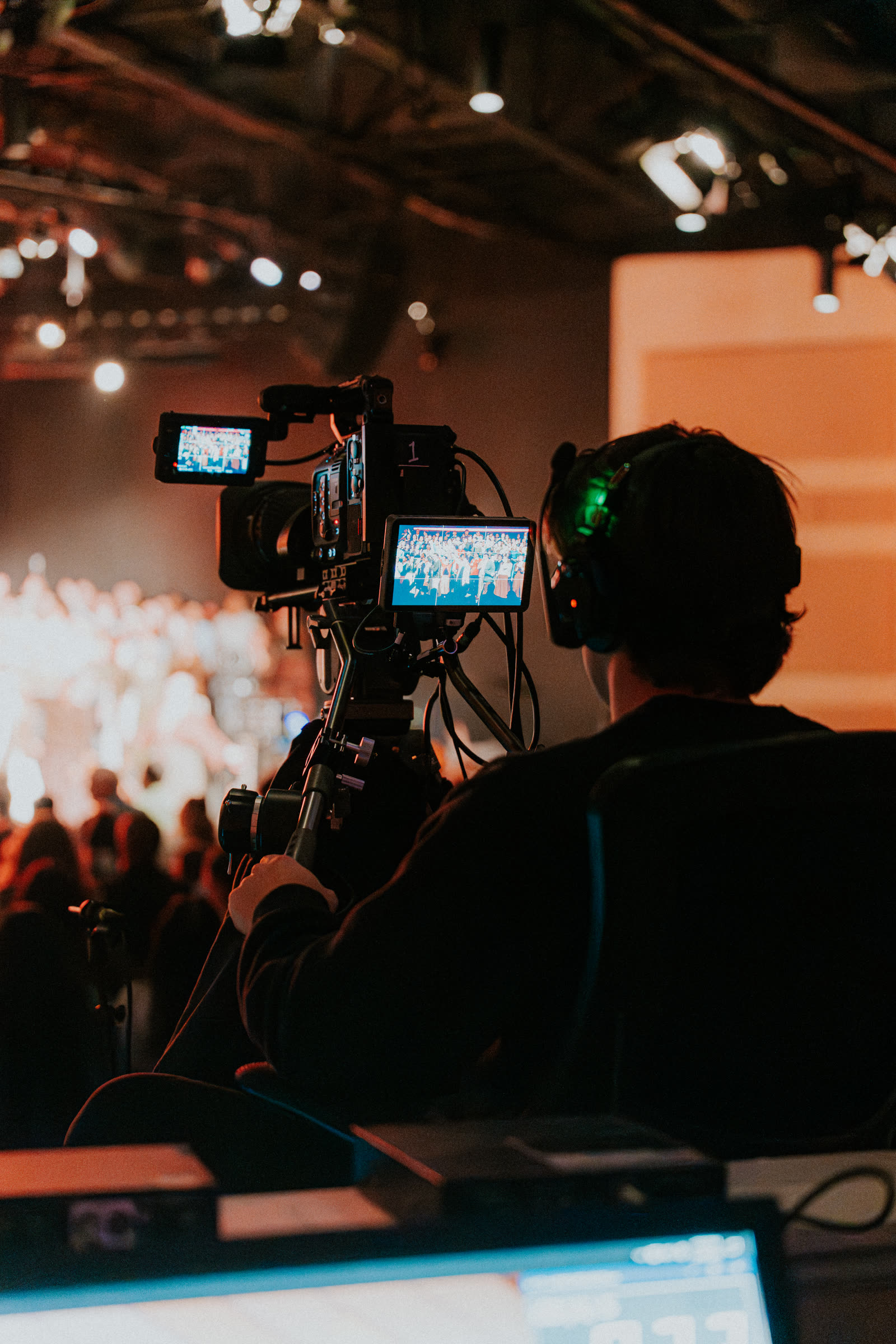Operator on a cinema rig in the crowd